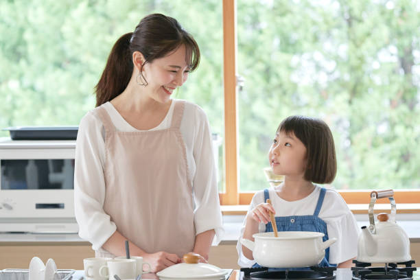 istock Asian family cooking at home 1293109622