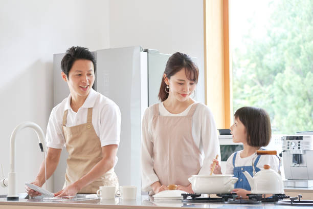 istock Asian family cooking at home 1293109629