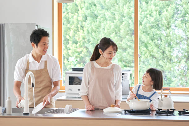 istock Asian family cooking at home 1293109631