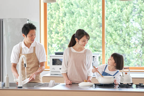 istock Asian family cooking at home 1293109680