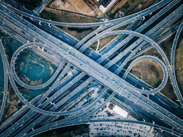 istock Aerial View Overpass Highway Traffic 1293118951