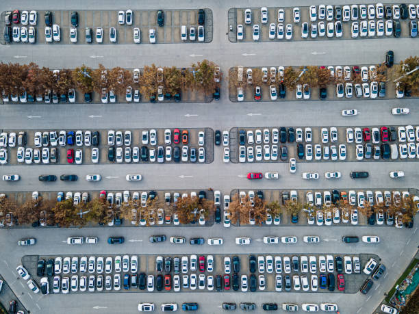 istock Aerial View Parking Lot 1293118954