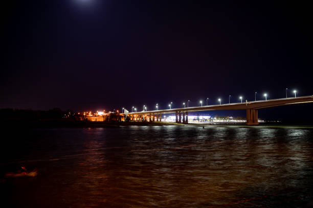 istock night. road bridge over the river with lights. 1293125968