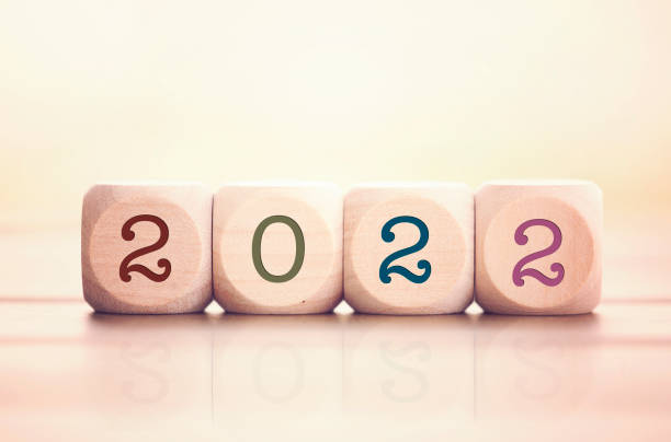 istock 2022 written on cube wooden blocks. 1293131182