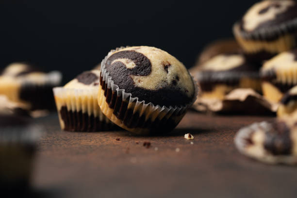 istock Homemade marble chocolate vanilla cupcakes. Delicious dessert. Selective focus 1293131405