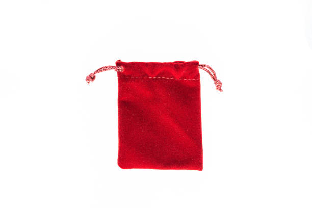 istock Red velvet bag isolated on white background 1293132248