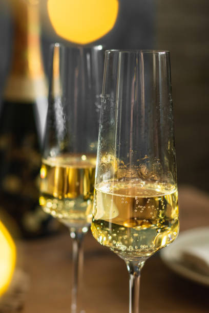 istock Celebrations with champagne, two glasses on the table 1293132844