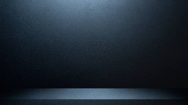 istock Black and blue abstract cement wall and studio room , interior texture for display products. wall background. 1293133060