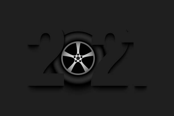 istock New Year numbers 2021 and car wheel 1293136891