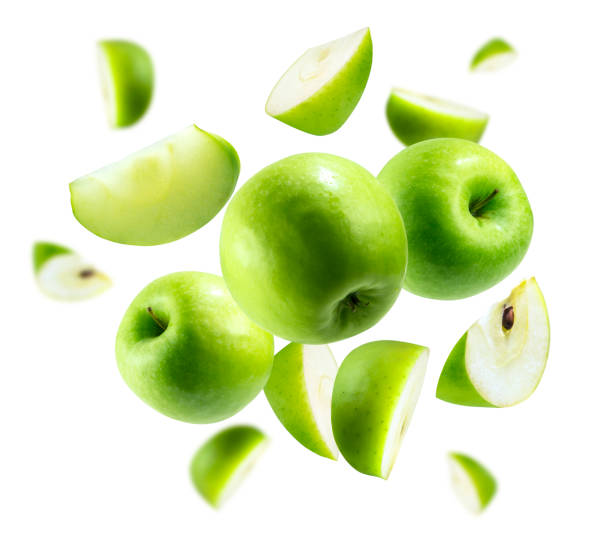 istock A group of green apples levitating on a white background 1293139200