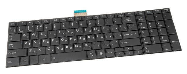 istock The new laptop Russian-English language keyboard on a white background 1293139975