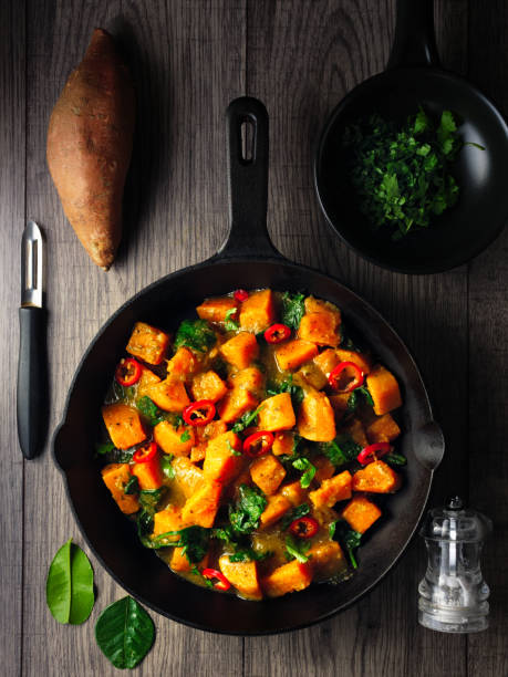 istock Healthy Vegan sweet potato spinach Thai curry 1293140238