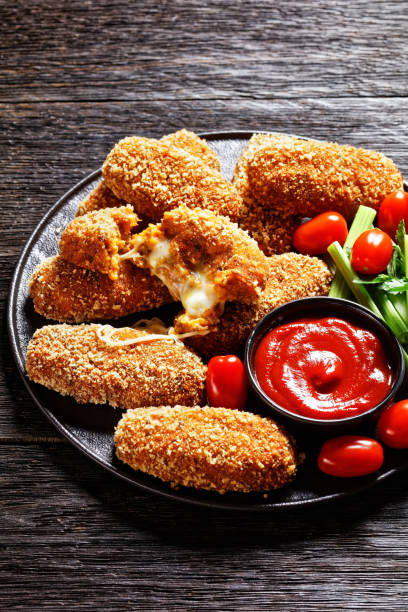 istock Deep-fried italian suppli al telefono rice croquettes stuffed with mozzarella 1293142848