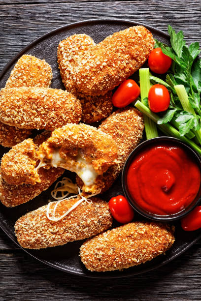 istock Deep-fried italian suppli al telefono rice croquettes stuffed with mozzarella 1293143372