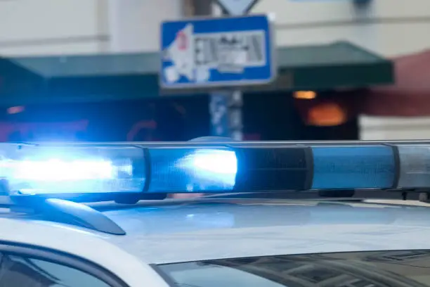 Blue light signal on a police car, visual emergency signal