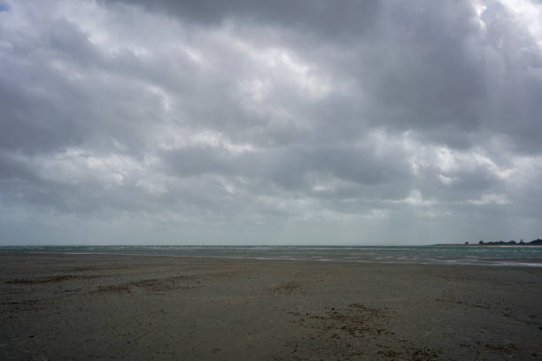 istock View of the tide out on a beach 1293151230