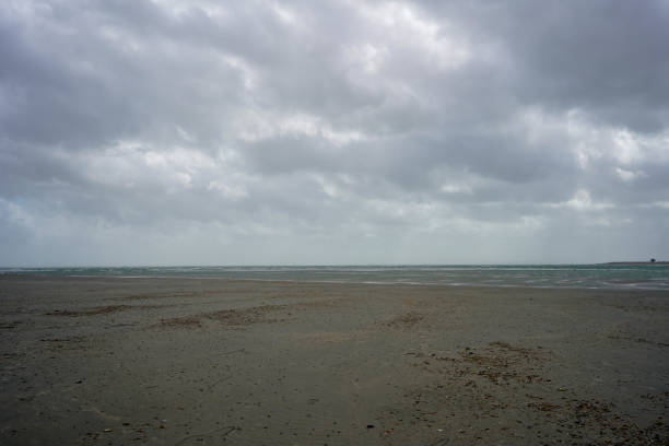 istock View of the tide out on a beach 1293151261
