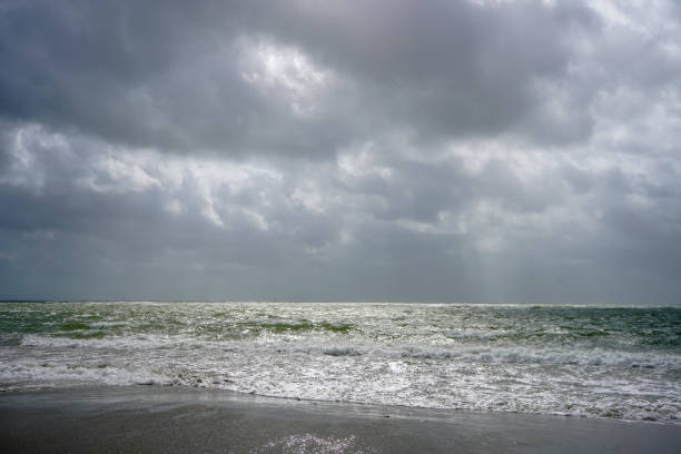 istock View of the tide out on a beach 1293151307