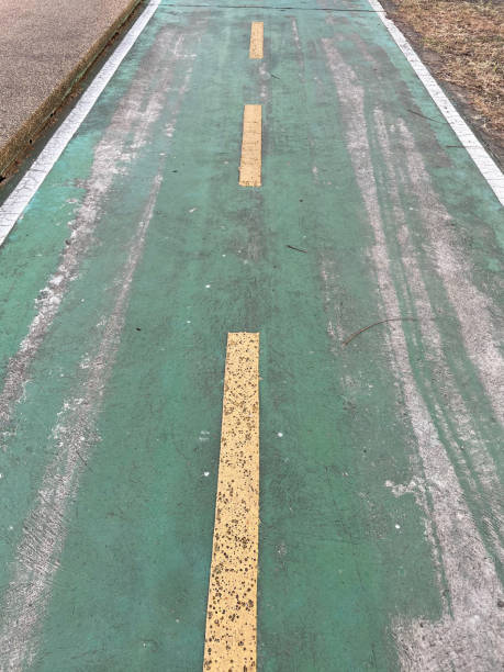 istock Bicycle lane yellow line 1293153776