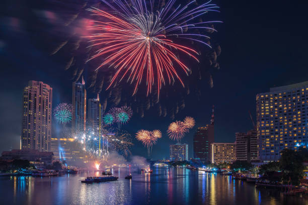 istock firework celebration in Bangkok city skyline with Twilight night and firework lighting in bangkok cityscape background, Thailand. 1293161000