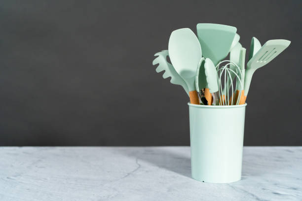 istock Silicone cooking utensils with wooden handle. 1293162218