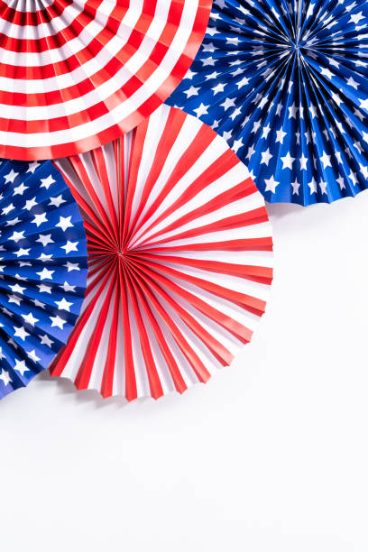 istock Red, white, and blue paper fans for July 4th celebration. 1293162498