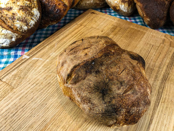 istock Oat and wheat sourdough bread with butter 1293165962