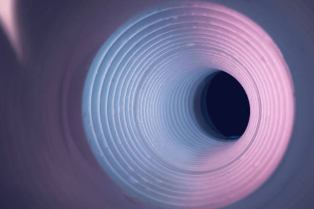 istock Beautiful round abstract pink tunnel with color light on a background pattern textured ford design. 1293166211