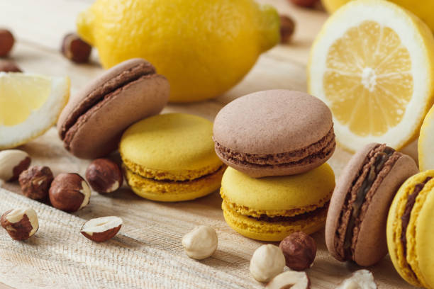 istock Yellow and brown french macarons with lemon and hazelnuts 1293170948