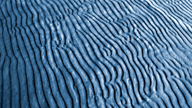 istock Sand, wave and sea. Natural background. 1293173735