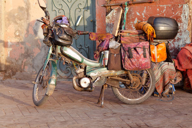 Old motorcycle with box in Medina of Marrakech
