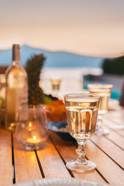 istock Romantic dinner table at sunset with sea view 1293179290