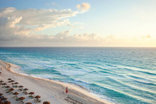 High angle view of the beach in Cancun, Mexico at dawn High angle view of the beach in Cancun, Mexico at dawn cancun photos stock pictures, royalty-free photos & images