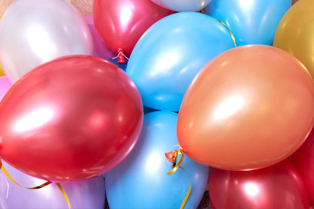 istock many colored balloons forming a bright background wallpaper image 1293190366