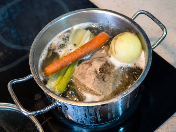 istock cooking of beef bouillon on stove at home kitchen 1293192276