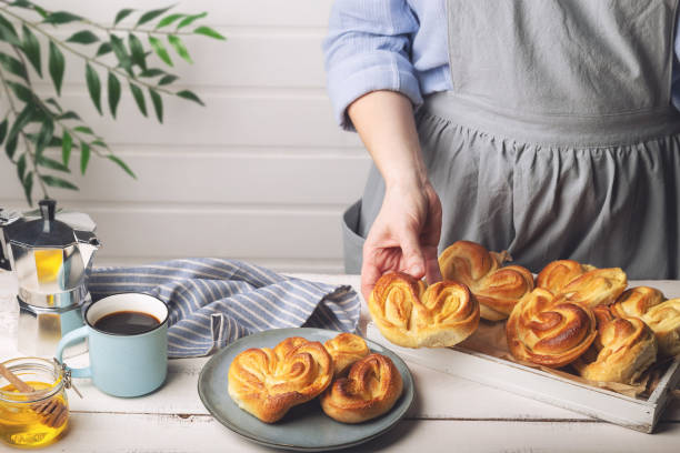 istock Homemade sweet buns in woman's hand 1293196577