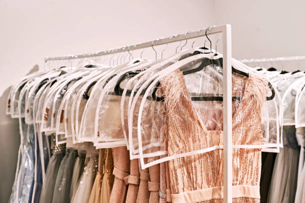 istock Various dresses in different colors on hangers in a rental service 1293196676