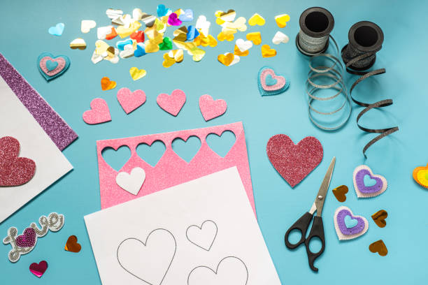 istock Valentine's day craft idea, glitter foam sheet hearts and decorations 1293197534