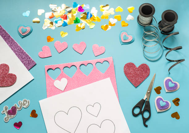 istock Valentine's day craft idea, glitter foam sheet hearts and decorations 1293197541