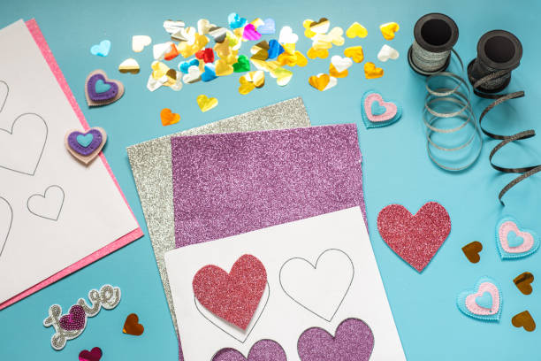 istock Valentine's day craft idea, glitter foam sheet hearts and decorations 1293197656