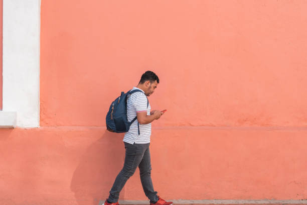 istock man walking down the street 1293206016