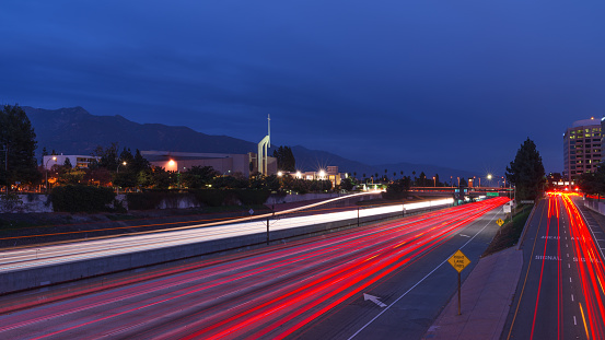 Pasadena, California, USA: image showing a view of the Foothill or 210 Freeway. The Lake Metro Station is in the middle ground and the Lake Avenue Church is on the left.