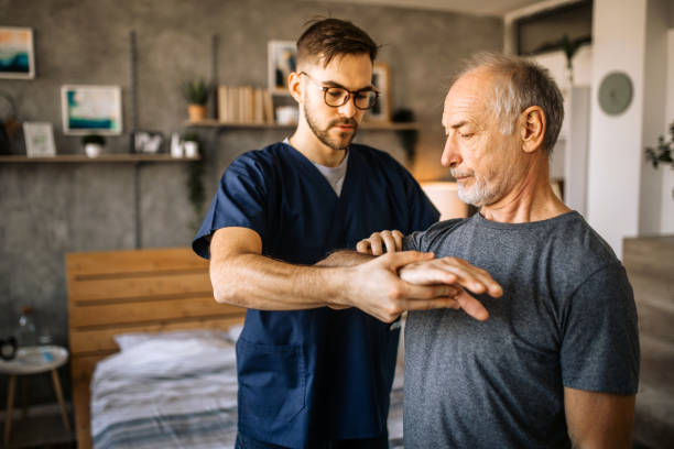 istock Senior man doing physical therapy exercises 1293212105