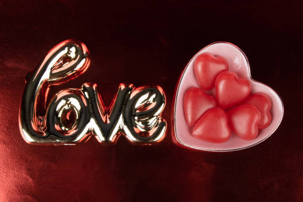 istock Love text, golden letters with Valentine's day concept 1293215972