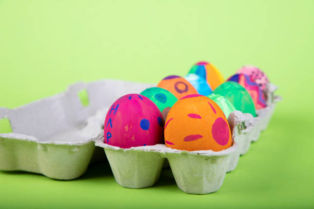 istock painted eggs with easter motives in an egg carton 1293217589