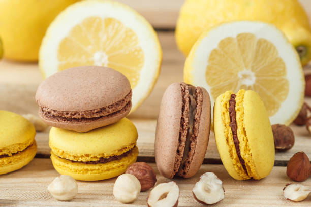 istock Yellow and brown french macarons with lemon and hazelnuts 1293223252