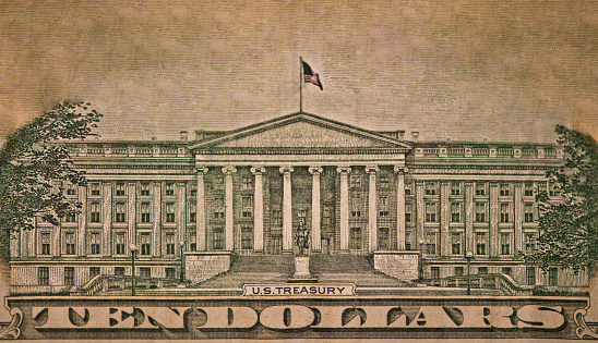 Closeup of front side of colorized 10 dollar banknote for design purpose