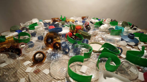 istock Plastic garbage pile from household collected on the table. Single-use or one time use waste discarded. City home trash made of plastic. Empty used bottles and cups create environmental pollution. 1293225595