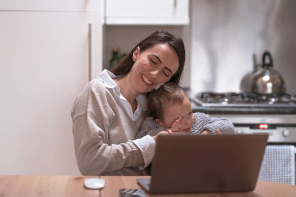 istock Young mother working at home with her daughter 1293227238