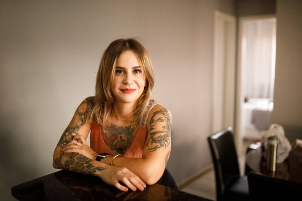 istock Woman standing and leaning on the countertop 1293247205